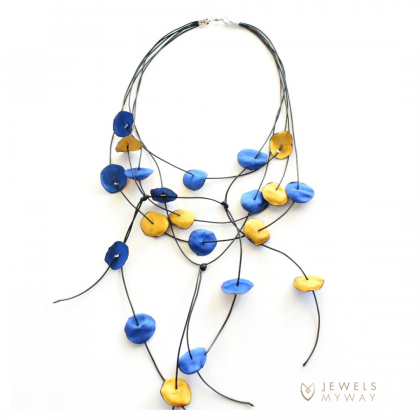 Joyful rose petals in blue and yellow.png